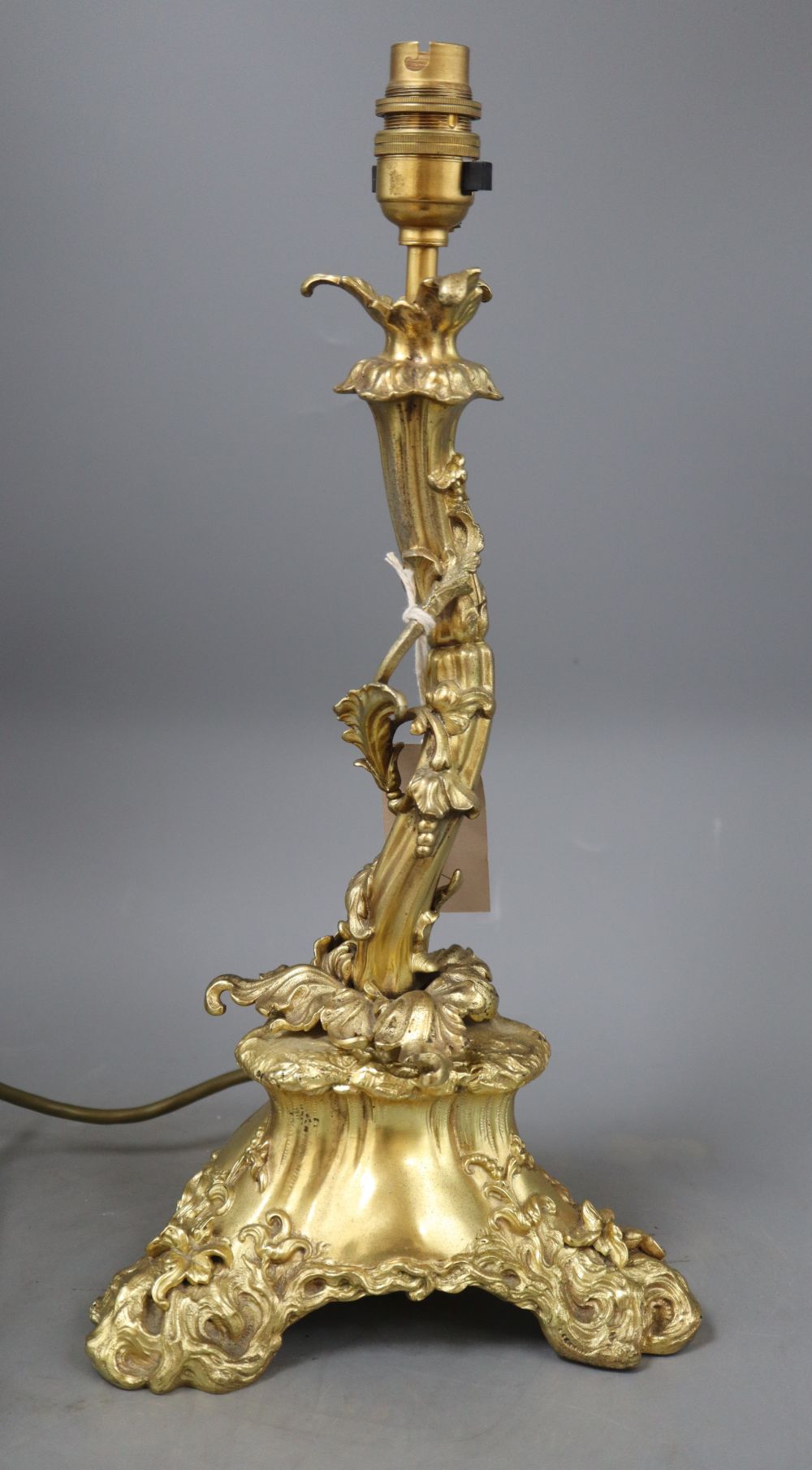 A gilt metal ormolu electric table lamp